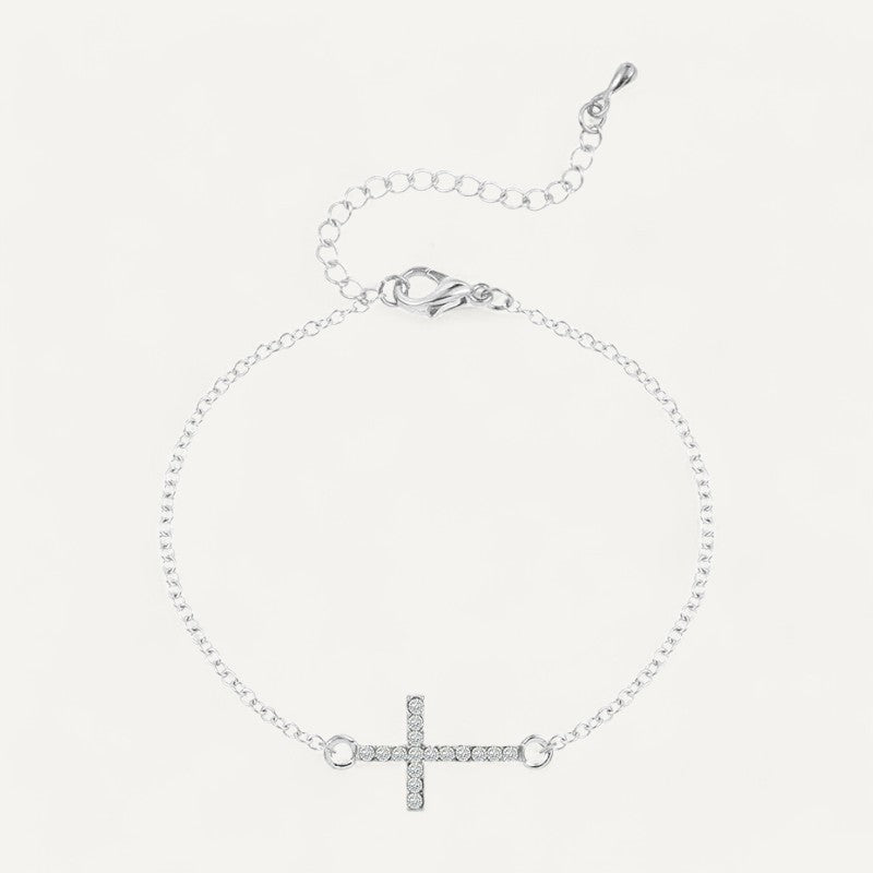 Armband aus Silber mit mit Kristallen besetztem Kreuz