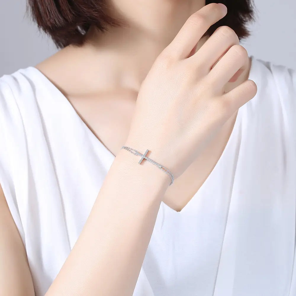 Rosa Damenarmband mit Kreuz