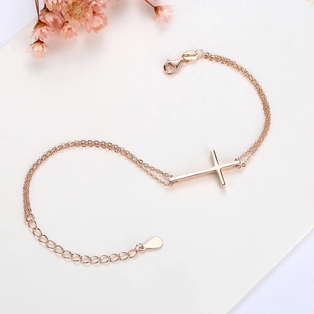 Rosa Damenarmband mit Kreuz