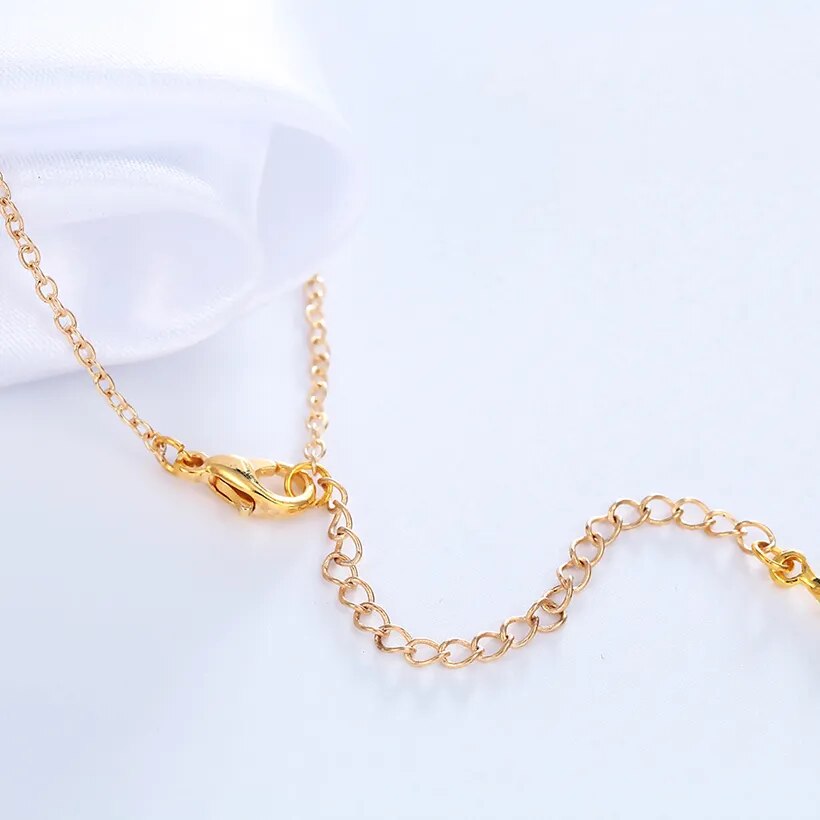 Armband aus Silber mit mit Kristallen besetztem Kreuz