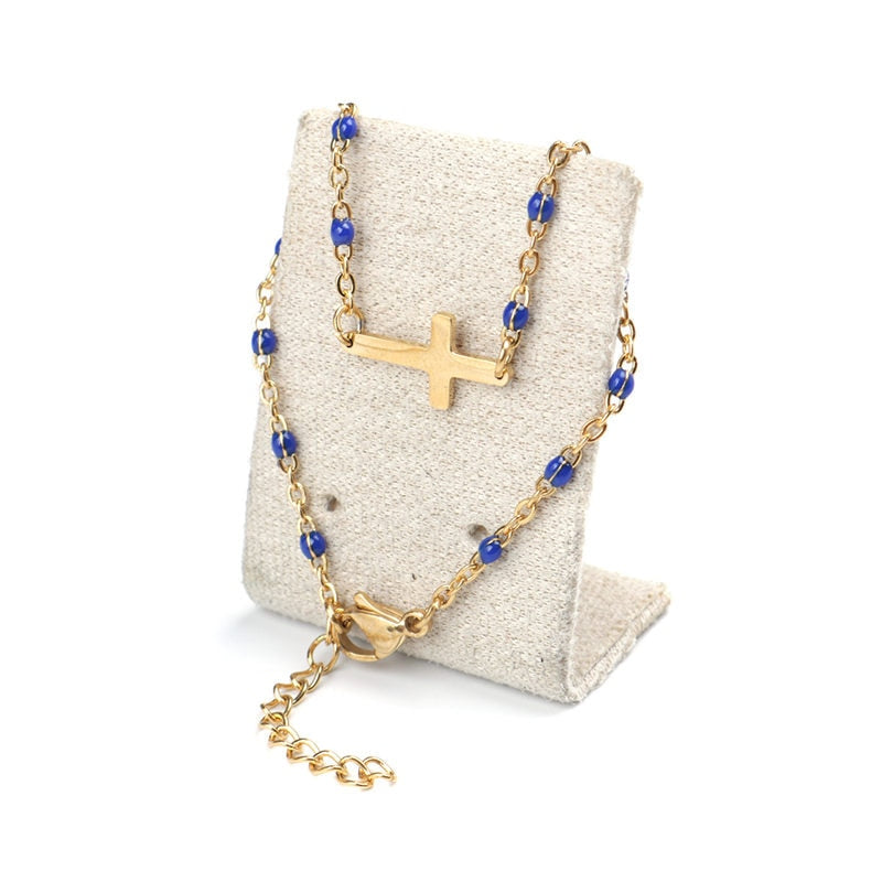 Kreuz-Armband in Gold mit Perlen