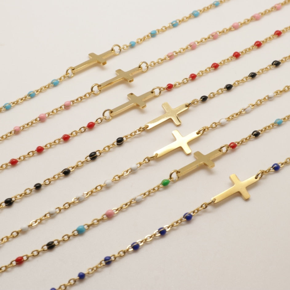 Kreuz-Armband in Gold mit Perlen