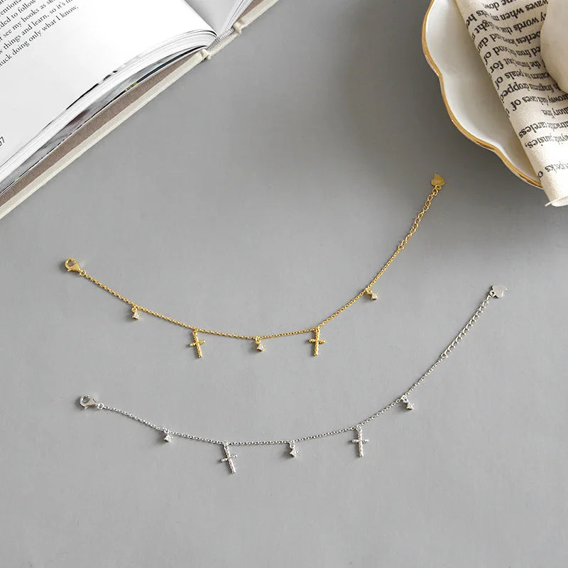 Elegante Kreuzarmbänder