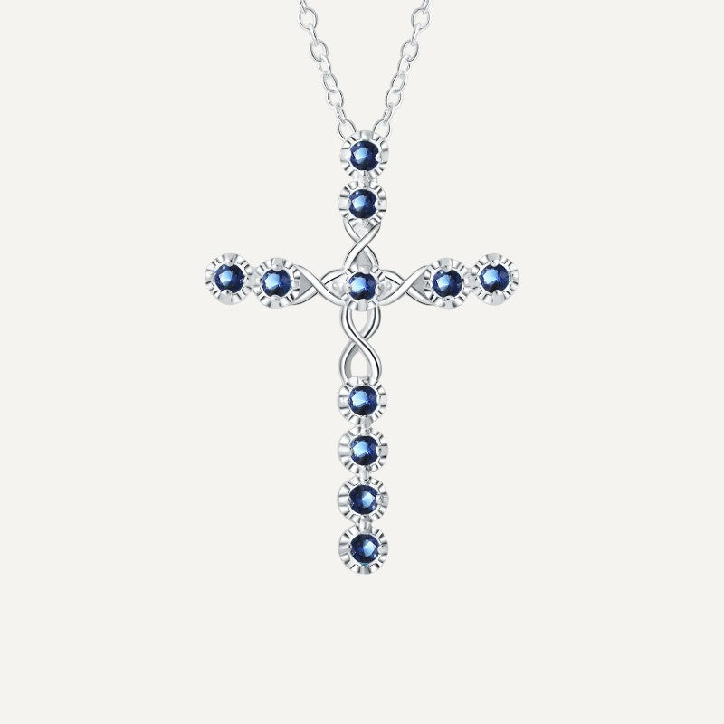 Kreuzanhänger mit Zirkonia-Kristallen in Blau