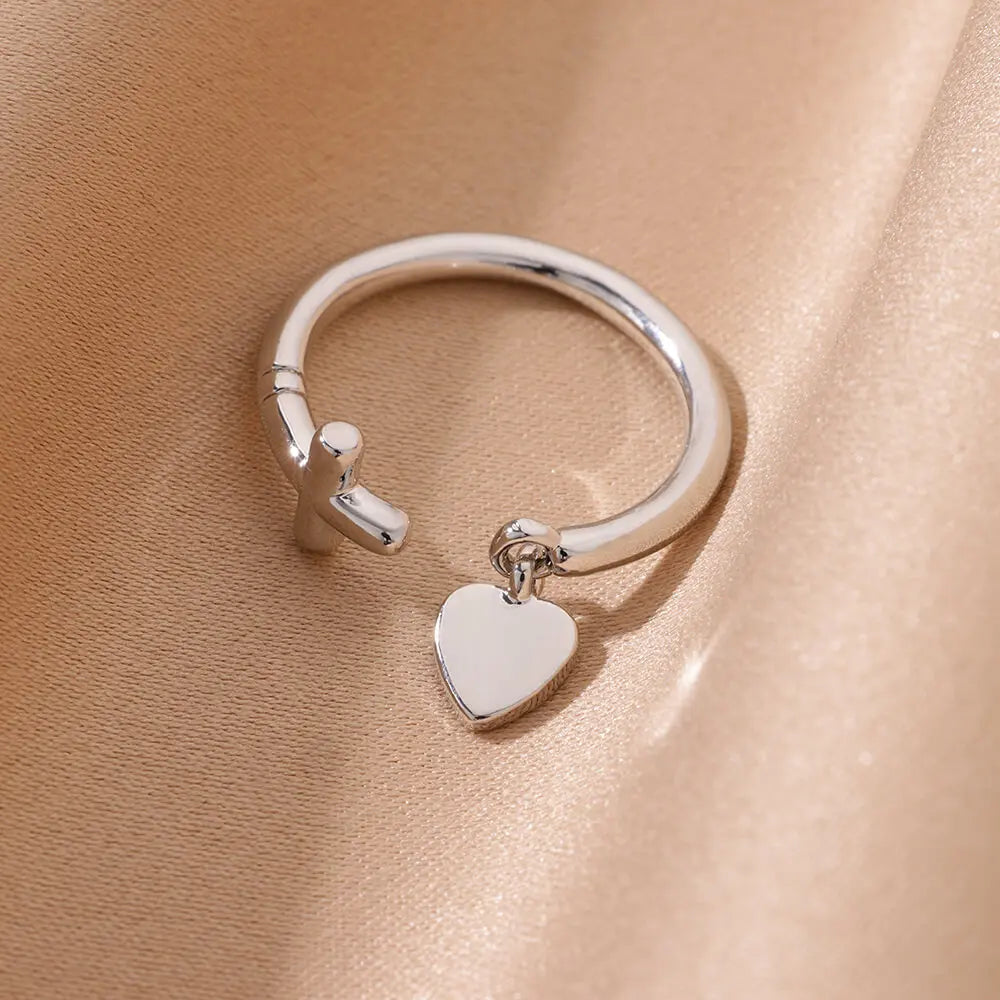 Ring mit Kreuz und Herz