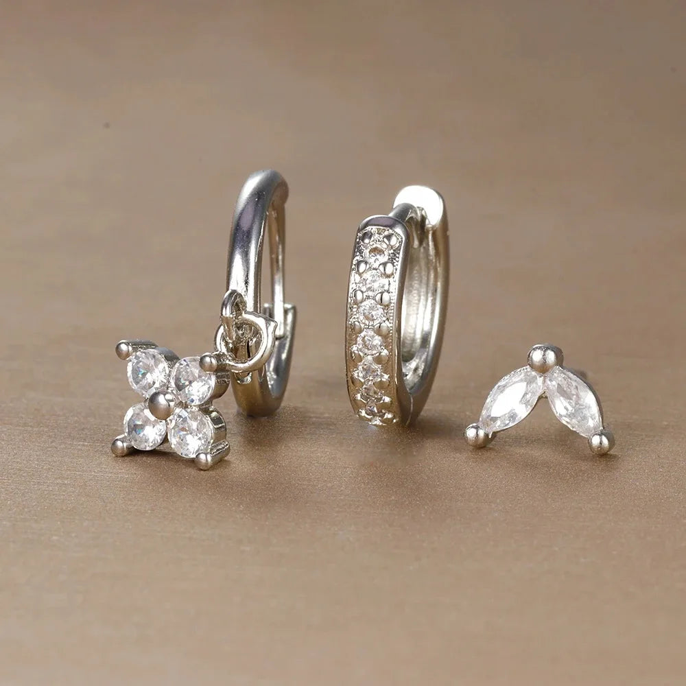 Elegante Ohrstecker und Creolen mit Zirkonia