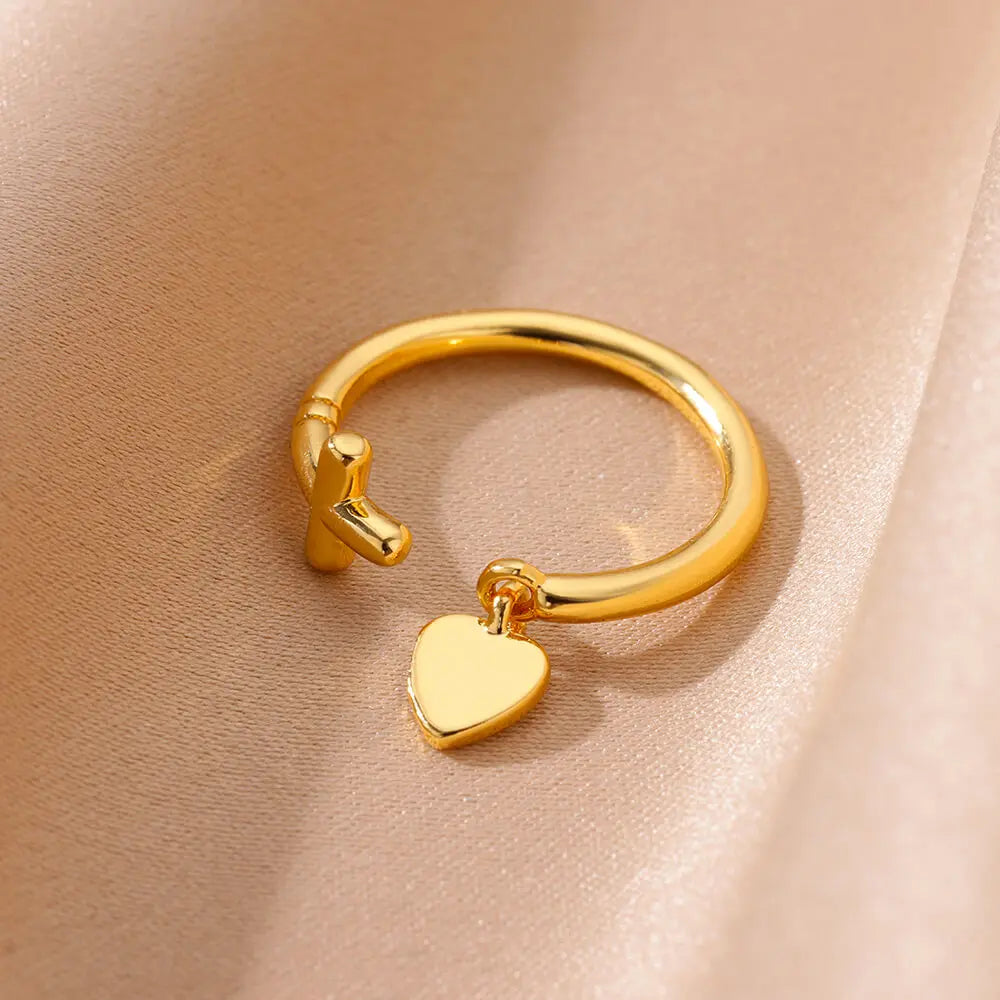 Ring mit Kreuz und Herz