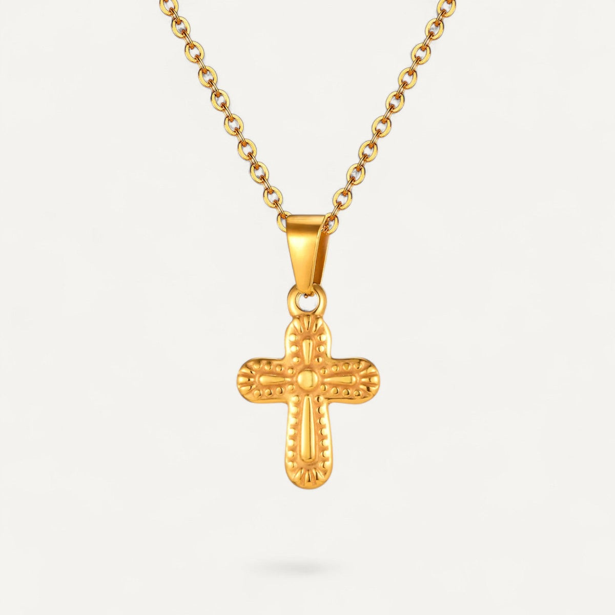 Goldene Kreuz Halskette mit gravierten Details